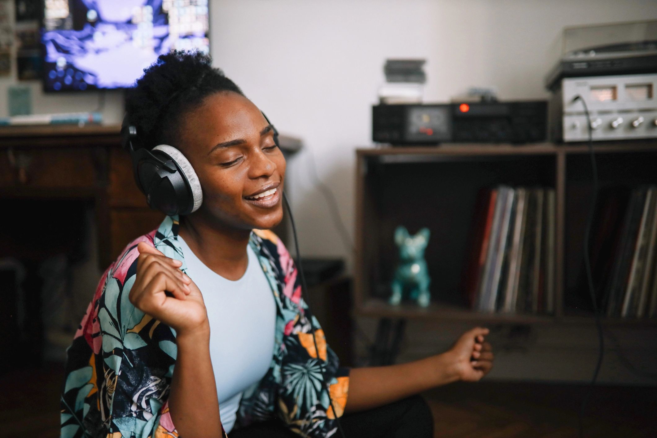 Person listening to music with headphones