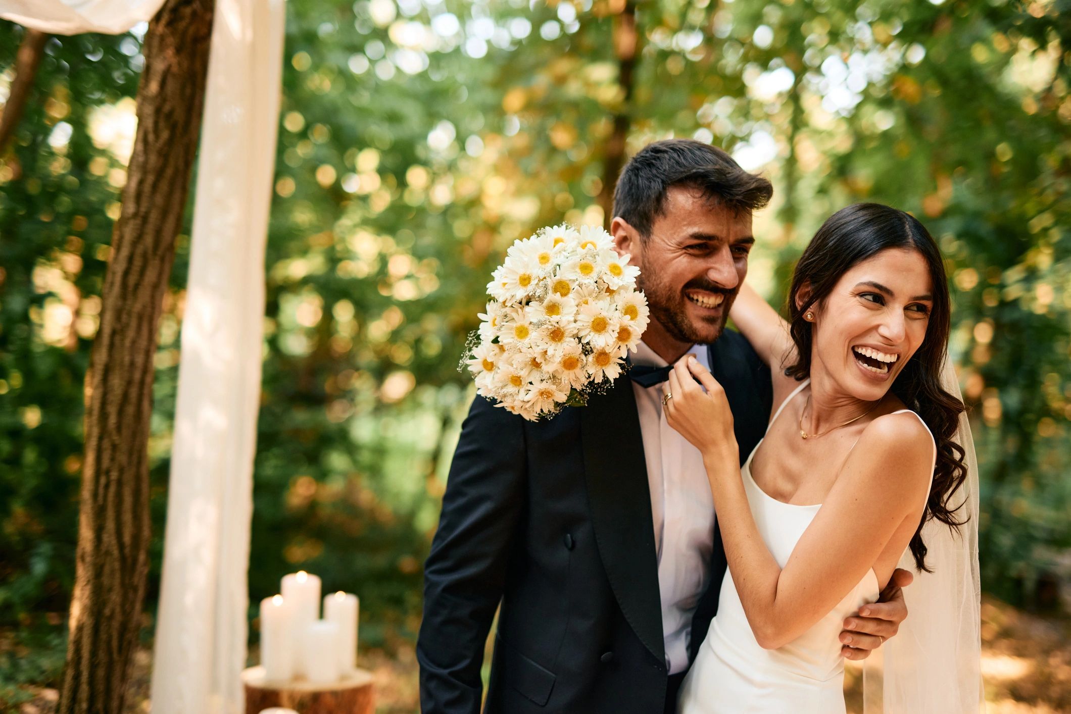 Newlyweds embracing outdoors