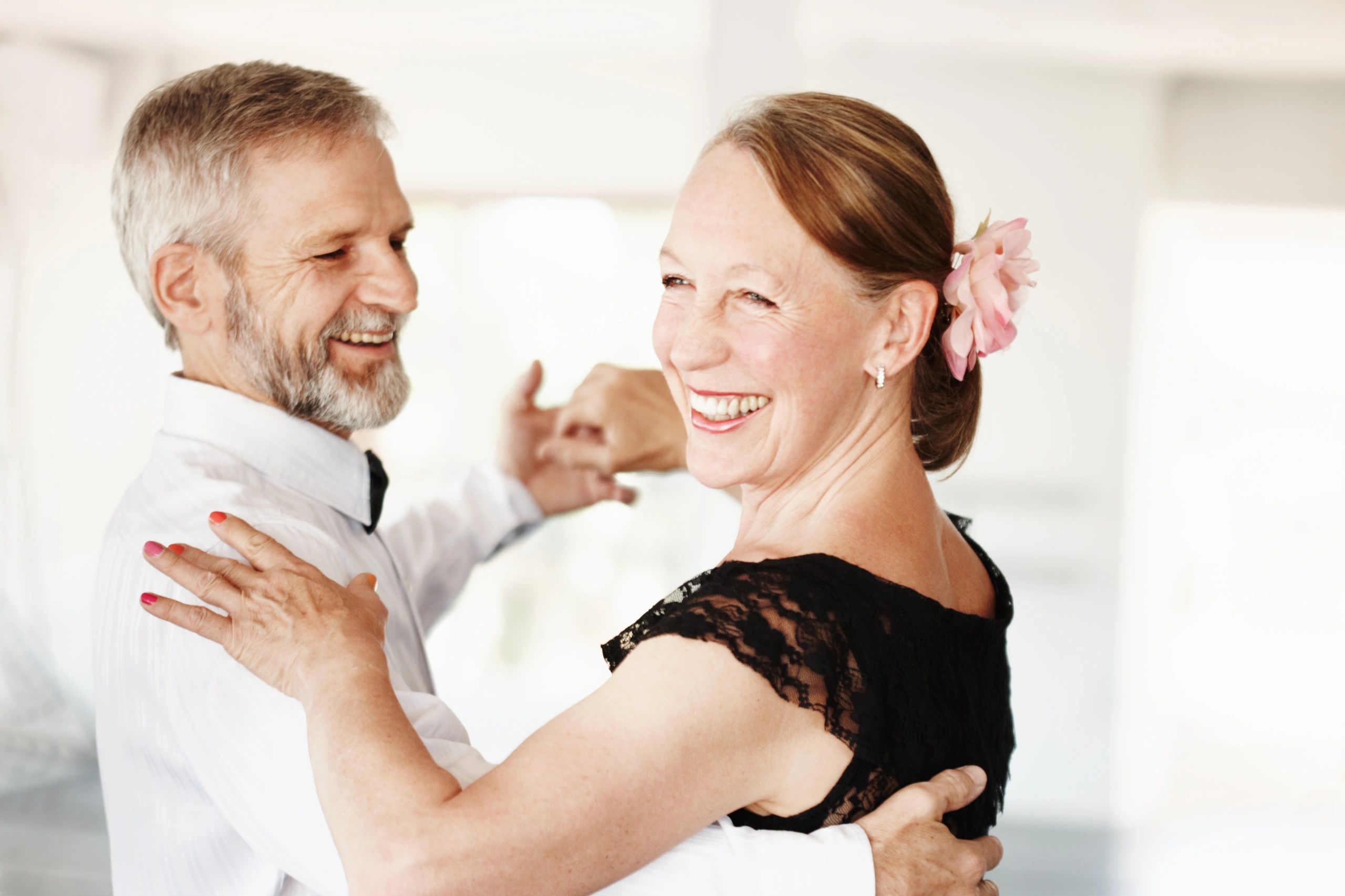 Couple dancing in formal attire